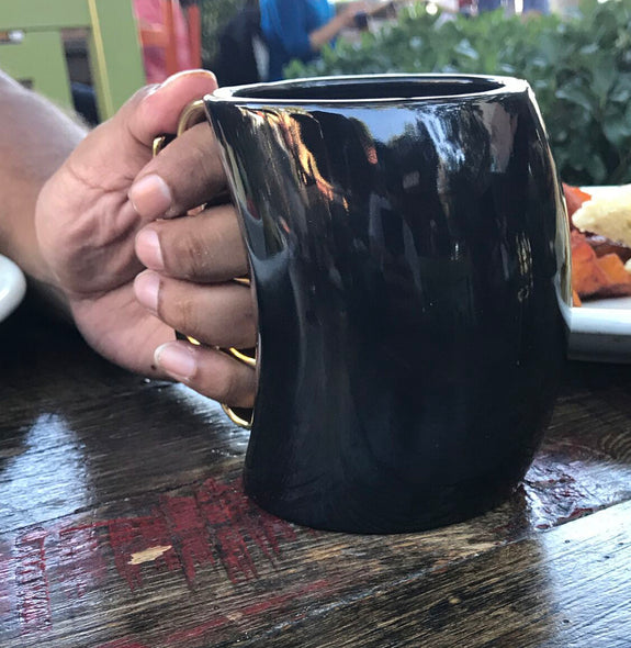 Brass Knuckles Coffee Mug