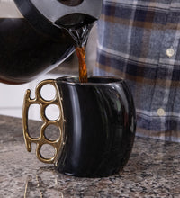 Brass Knuckles Coffee Mug